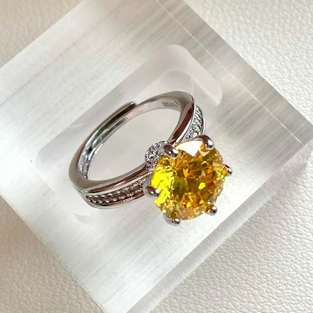 Sterling Silver Ring with Yellow Round Center Stone
